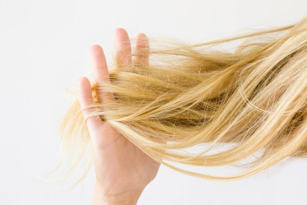 best elchim hair dryer elchim 3900 healthy ionic woman hand through blonde long hair
